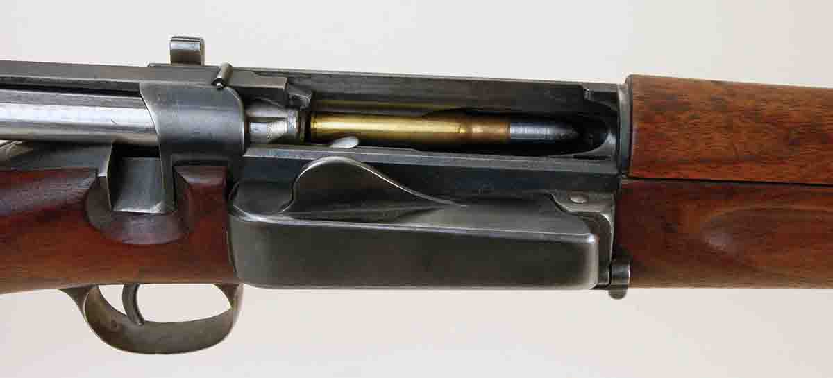 An Army U.S. Krag Model 1896 is shown with a cast-bullet load ready for chambering.